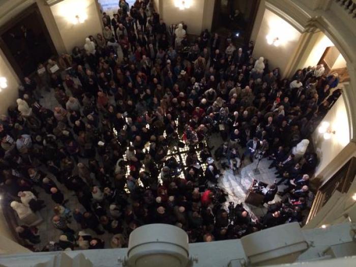 Hundreds of religious freedom advocates gathered on January 13, 2015, for the 'Standing for our Faith Rally' in the Georgia State Capitol rotunda in a show of support for ousted Atlanta Fire Chief Kelvin Cochran who was fired on Jan. 6 for espousing his Christian beliefs in a self-published book and distributing copies in the workplace.