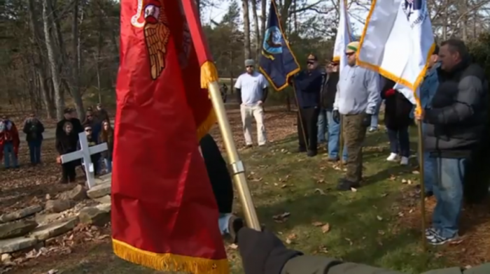 Residents in King, North Carolina, gather to the town's central park to protest the city council's removal of a memorial, which featured a soldier kneeling before a cross to honor of a fallen comrade, January 11, 2015.