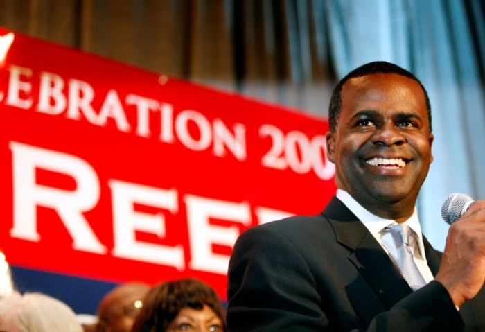 Mayoral candidate Kasim Reed smiles at his supporters after declaring victory in Atlanta, Georgia, December 1, 2009.His opponent, Mary Norwood, refused to concede her run-off election with Reed who was ahead by less than a thousand votes, local media reported.