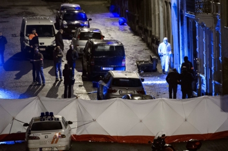 Belgian police inspect an apartment in central Verviers, a town between Liege and the German border, in east Belgium, January 15, 2015. Belgian police killed two men who opened fire on them during one of about a dozen raids on Thursday against an Islamist group that federal prosecutors said was about to launch "terrorist attacks on a grand scale". A third man was detained in the eastern city of Verviers, where police commandos ran into a hail of gunfire after trying to gain entry to an apartment above a town centre bakery.