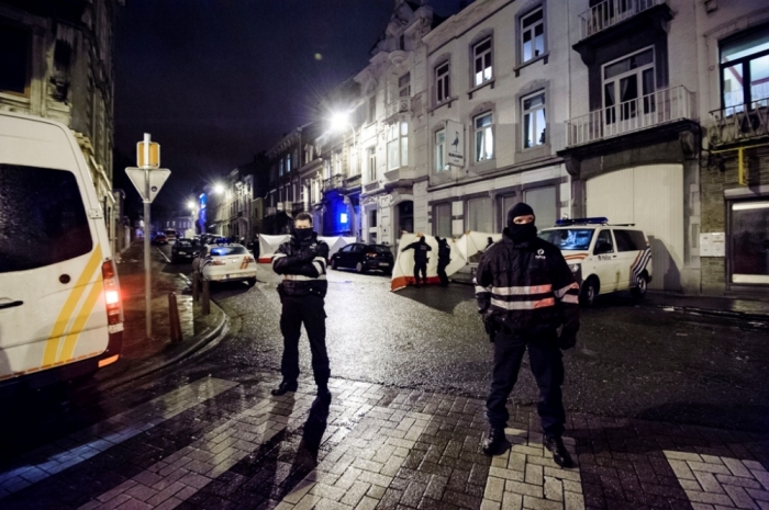 Belgian police block a street in central Verviers, a town between Liege and the German border, in the east of Belgium, January 15, 2015. At least two people were killed when Belgian counter-terrorist police raided an apartment used by suspected Islamist radicals on Thursday, local media said, describing a coordinated, national operation related to last week's attacks in Paris. Judiciary officials confirmed only that a counter-terrorism operation took place in Verviers.
