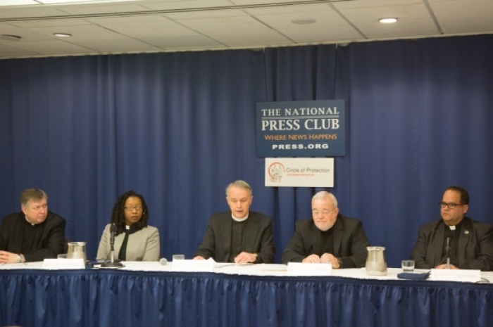 Speakers from various Christian organizations speak at a press conference in Washington D.C., announcing a coalition of 100 faith leaders who ware urging 2016 presidential candidates to post videos stating how they will help alleviate hunger and poverty.
