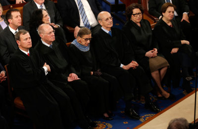 U.S. Supreme Court Chief Justice John Roberts and Associate Justices (L-R) Anthony Kennedy, Ruth Bader Ginsburg, Stephen Breyer, Elena Kagan and Sonya Sotomayor listen to U.S. President Barack Obama as he delivers his State of the Union address to a joint session of the U.S. Congress on Capitol Hill in Washington, January 20, 2015.