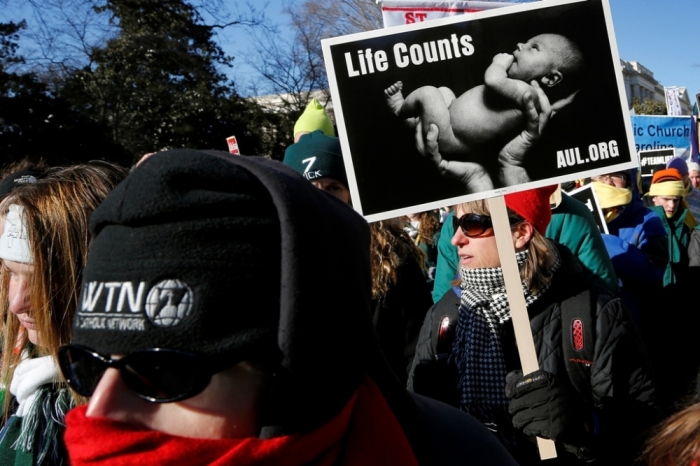 Pro-life activists participate in the annual March for Life in Washington, January 22, 2014. 