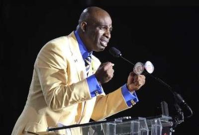 Former Dallas Cowboy Deion Sanders delivers his acceptance speech during his induction into the NFL Pro Football Hall of Fame in Canton, Ohio August 6, 2011.