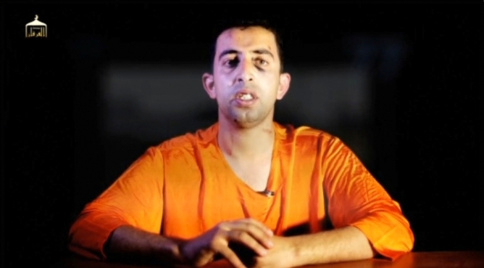 A man purported to be Islamic State captive Jordanian pilot Muath al-Kasaesbeh speaks in this still image from an undated video filmed from an undisclosed location made available on social media on February 3, 2015. Islamic State militants released the video on Tuesday purporting to show Kasaesbeh being burnt alive, and Jordanian state television said he was murdered a month ago. Reuters could not immediately confirm the video, which showed a man resembling the captive pilot standing in a black cage before being set ablaze.