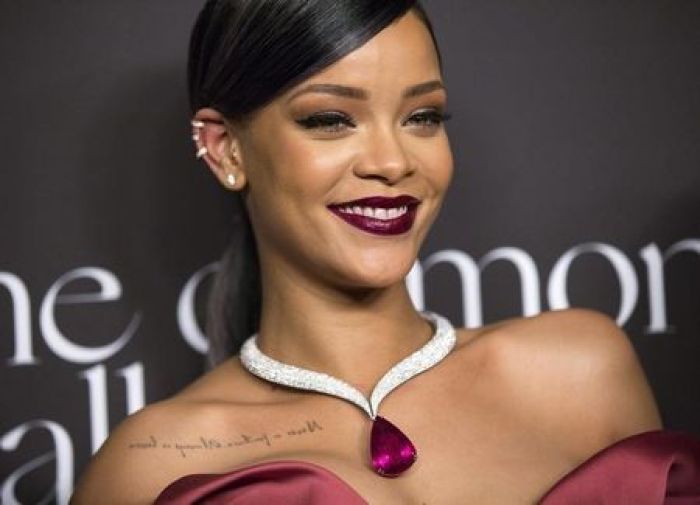 Singer Rihanna poses at the First Annual Diamond Ball fundraising event at The Vineyard in Beverly Hills, California December 11, 2014.
