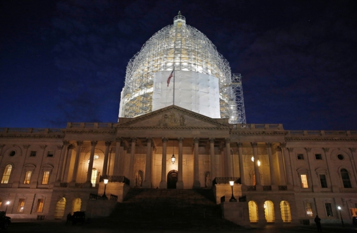 The U.S. Capitol building is seen before President Barack Obama arrives to deliver his State of the Union address to a joint session of the U.S. Congress on Capitol Hill in Washington, January 20, 2015.