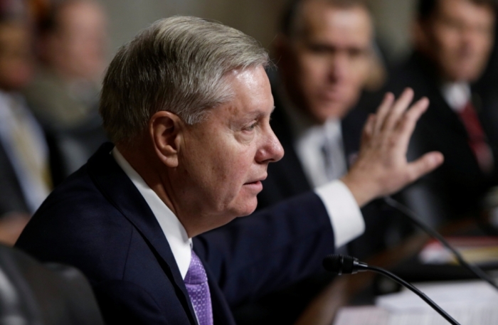 U.S. Senator Lindsey Graham, R-S.C., questions Ashton Carter, U.S. President Barack Obama's nominee to be secretary of defense, during a Senate Armed Services Committee confirmation hearing on Capitol Hill in Washington, February 4, 2015.
