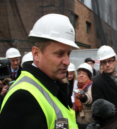 Steve Green, president of Hobby Lobby, answers questions from the media at the future site of the Museum of the Bible in Washington, Thursday, February 12, 2015.