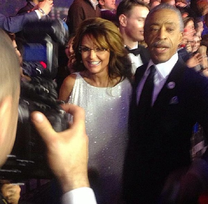 2008 GOP vice presidential candidate and former Alaska Gov. Sarah Palin (L) poses with civil rights activist and Baptist minister Al Sharpton at the 'Saturday Night Live' 40th anniversary special on Sunday, February 16, 2016.