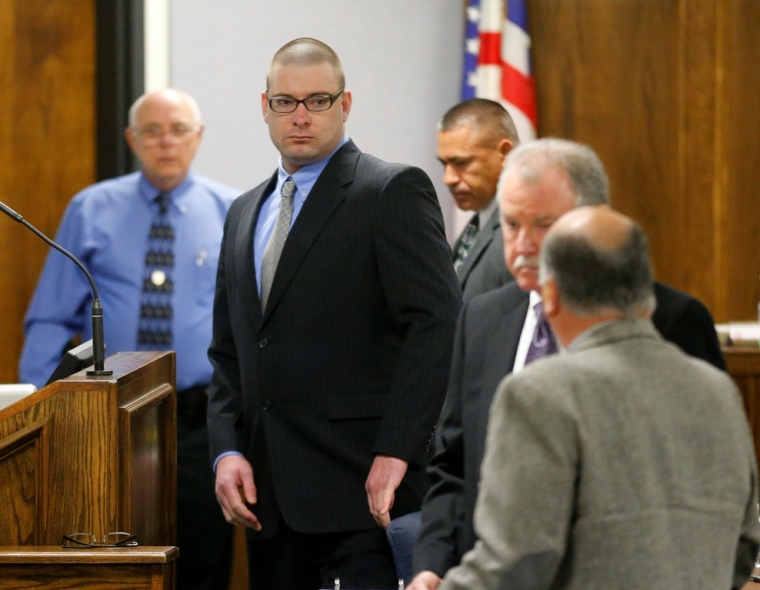 Former Marine Eddie Ray Routh (2nd L) appears in court on opening day of his capital murder trial at the Erath County Donald R. Jones Justice Center in Stephenville, Texas, February 11, 2015. Eddie Ray Routh, 27, is charged with murdering Navy SEAL Chris Kyle, who was credited with the most kills of any U.S. sniper, and Kyle's friend Chad Littlefield in 2013.