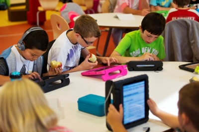 Students practise on their iPads at the Steve Jobs school in Sneek, August 21, 2013. The Steve Jobs schools in the Netherlands are founded by the Education For A New Time organization, which provides the children with iPads to help them learn with a more interactive experience.