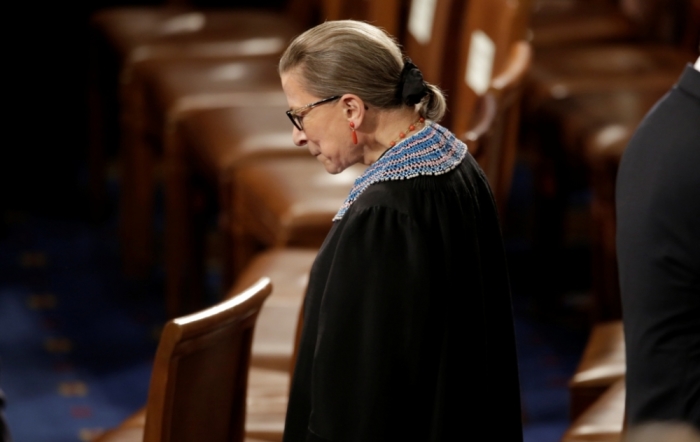U.S. Supreme Court Associate Justice Ruth Bader Ginsburg arrives to watch U.S. President Barack Obama's State of the Union address to a joint session of the U.S. Congress on Capitol Hill in Washington, January 20, 2015.