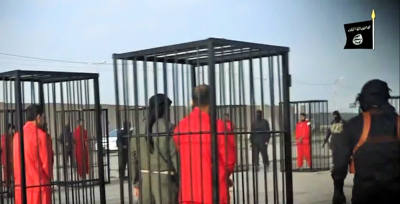 ISIS released a video showing caged Kurdish soldiers being paraded on Iraqi streets.