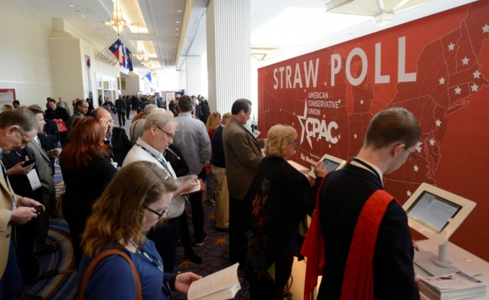 Guests queue to place their votes in an electronic straw poll for possible presidential candidates at the Conservative Political Action Conference in National Harbor, Maryland, February 28, 2015. CPAC closes after three days where thousands of conservative activists, Republicans and Tea Party Patriots gathered to hear politicians, presidential hopefuls, and business leaders speak, lobby and network for a conservative agenda, ahead of the presidential election in 2016.