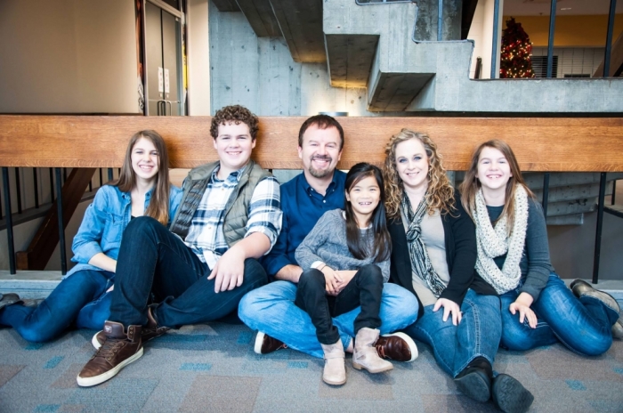 Casting Crowns lead vocalist, youth pastor Mark Hall (C) and his family.
