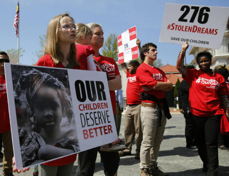 Protesters march in support of the girls kidnapped by members of Boko Haram in front of the Nigerian Embassy in Washington May 6, 2014.