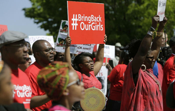 Protesters march in support of the girls kidnapped by members of Boko Haram in front of the Nigerian Embassy in Washington May 6, 2014.