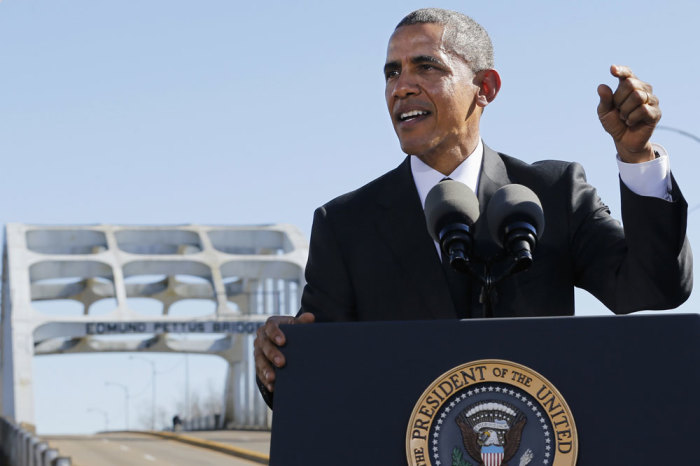 U.S. President Barack Obama delivers remarks at the Edmund Pettus Bridge in Selma, Alabama, March 7, 2015. With a nod to ongoing U.S. racial tension and threats to voting rights, Obama declared the work of the Civil Rights Movement advanced but unfinished on Saturday during a visit to the Alabama bridge that spawned a landmark voting law.