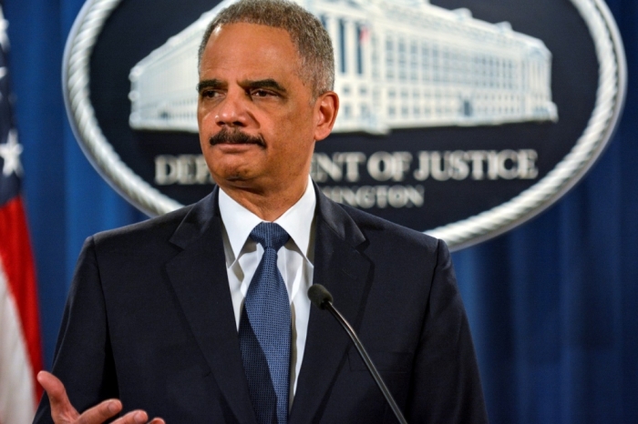 U.S. Attorney General Eric Holder addresses the Justice Department's findings in two investigations regarding the Ferguson, Missouri shooting of Michael Brown by Darren Wilson in Washington, March 4, 2015.