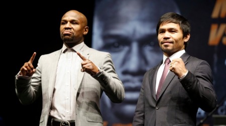 Boxing icons Floyd Mayweathe Jr. and Manny Pacquiao present during the press conference for "the biggest fight in boxing history" held in downtown Las Vegas.