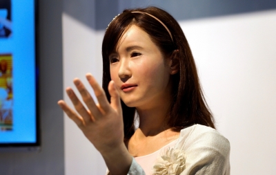 ChihiraAico, a communication android robot, gestures to show goers at the Toshiba booth at the International Consumer Electronics show in Las Vegas, Nevada, January 6, 2015. The robot is controlled by pneumatics.