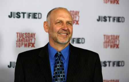 Cast member Nick Searcy poses at a premiere screening for season 5 of the television series "Justified" at the DGA theatre in Los Angeles, California, January 6, 2014.
