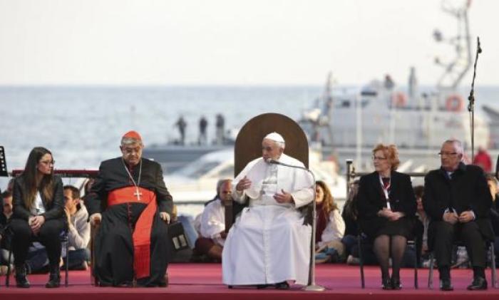 Pope Francis attends a meeting with youths at the seafront during his pastoral visit in Naples March 21, 2015.