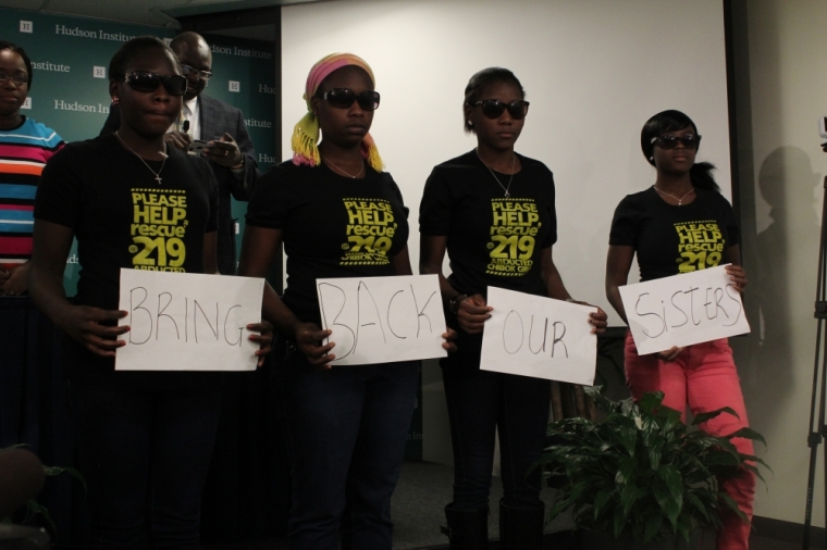 Four Chibok girls, who were kidnapped by Boko Haram in April 2014 and later escaped, acting as silent witnesses during a Hudson Institute discussion on Boko Haram in Washington D.C. on March 23, 2015.