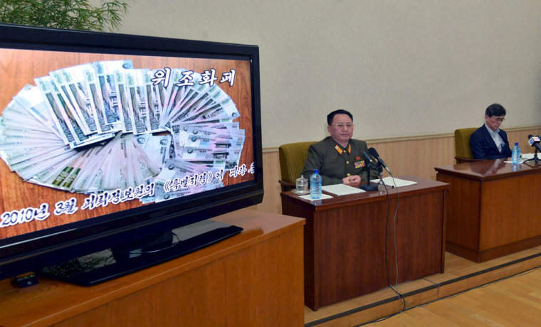 One of the two men whom North Korea identified as being South Korean (R) and accused of being a spy for South Korea attends a news conference in Pyongyang, in this undated photo released by North Korea's Korean Central News Agency (KCNA) in Pyongyang March 26, 2015. North Korea said late on Thursday it had arrested two South Koreans based in the Chinese border city of Dandong, accusing them of spying for South Korea. The North's official KCNA news agency showed images of two middle-aged men it identified as Kim Kuk Gi and Choe Chun Gil speaking at a news conference in the North Korean capital, Pyongyang.