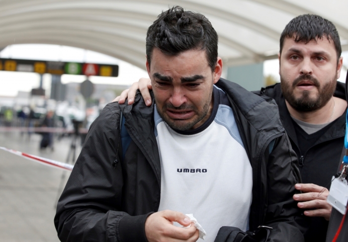 Family members of passengers feared killed in Germanwings plane crash react at Barcelona's El Prat airport March 24, 2015. No one survived when an Airbus A320 passenger plane operated by Lufthansa's budget subsidiary Germanwings flight crashed in southern France on Tuesday and it is likely to take days to recover the bodies of those on board due to difficult terrain, French police at the crash site said.