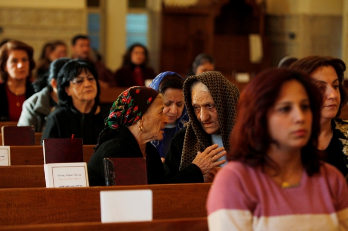 Iraqi Christians attend mass at Mar George Chaldean Church in Baghdad, March 1, 2015. Iraqi Christians say they have no intention of leaving the country despite the recent abduction of over 100 Assyrian Christians by the Islamic State.