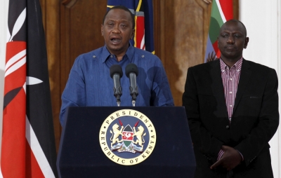 Kenyan President Uhuru Kenyatta (L), flanked by his Deputy William Ruto, addresses a news conference at the State House in the capital Nairobi, April 4, 2015. Kenyatta said on Saturday that those behind an attack in which al-Shabaab Islamist militants killed 148 people at a university were 'deeply embedded' in Kenya, and called on Kenyan Muslims to help prevent radicalization.