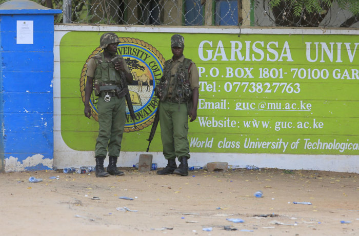 Kenya Administration policemen stand in front of Garissa University College in Garissa April 4, 2015. The death toll in an assault by Somali militants on Garissa University College is likely to climb above 147, a government source and media said on Friday, as anger grew among local residents over what they say as a government failure to prevent bloodshed.