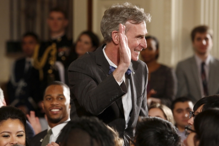 Bill Nye 'The Science Guy' acknowledges applause as U.S. President Barack Obama mentions him in his remarks at the 2015 White House Science Fair at the White House in Washington, March 23, 2015.