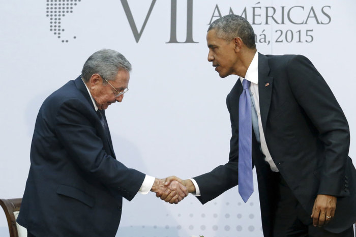 U.S. President Barack Obama shakes hands with Cuba's President Raul Castro as they hold a bilateral meeting during the Summit of the Americas in Panama City April 11, 2015. Obama and Castro shook hands on Friday at the summit, a symbolically charged gesture as the pair seek to restore ties between the Cold War foes.