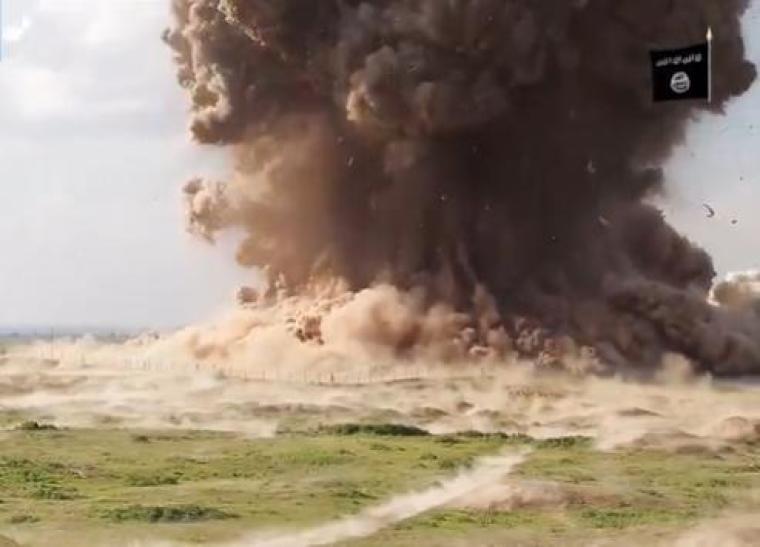 The biblical city of Calah, also known as Nimrud, being blown to pieces by barrel bombs detonated by the Islamic State in northern Iraq.
