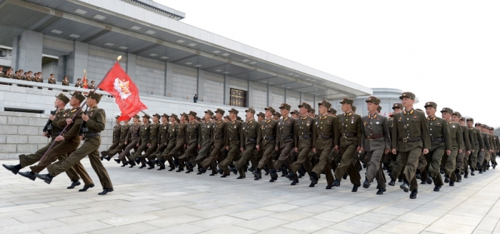Korean People's Army personnel march during a ceremony marking the birth anniversary of late leader Kim Il Sung at the Kumsusan Palace of the Sun in Pyongyang April 12, 2015 in this photo released by North Korea's Korean Central News Agency.