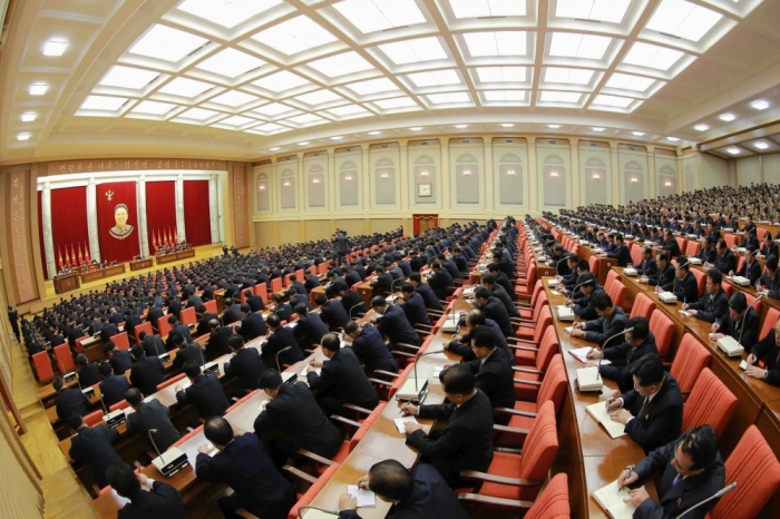 People attend an expanded meeting of the Political Bureau of the Central Committee of the Workers' Party of Korea, under the guidance of North Korean leader Kim Jong Un, in Pyongyang, North Korea, February 18, 2015.