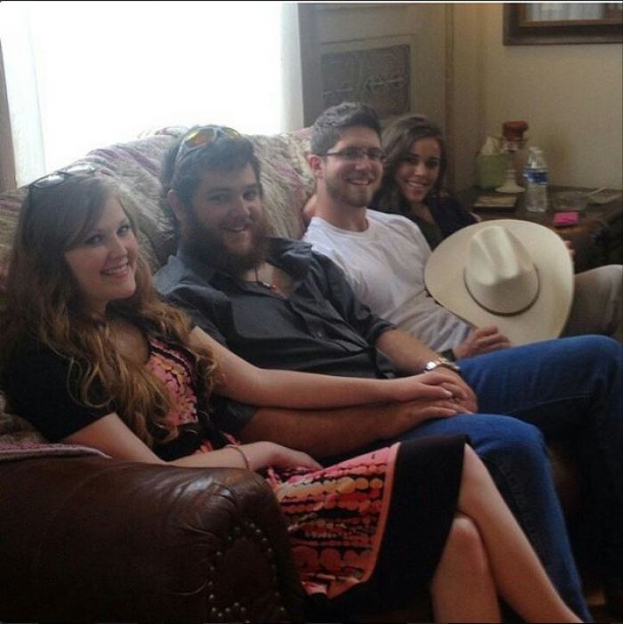 Pregnancy rumors sparked when Ben Seewald posted this photo of him covering his wife Jessa Duggar's stomach with his cowboy hat on Instagram.