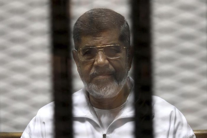 Egypt's former president Mohamed Morsi sentenced to 20 years in prison over the killing of demonstrators outside his palace in 2012.