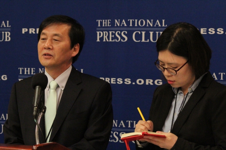 Director of Free North Korea Radio Kim Seong-min (L) speaks at the National Press Club in Washington D.C. at a press conference on April 27, 2015.