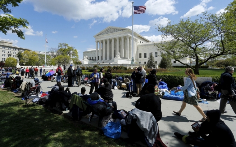 People wait in line, some as paid place-holders, for as many as four days, to get a seat in the gallery to watch arguments in the same-sex marriage case Obergefell v. Hodges, at the U.S. Supreme Court in Washington, April 27, 2015. The U.S. Supreme Court will hear a potentially historic case on Tuesday over the legality of same-sex marriage, in oral arguments that will cap more than two decades of litigation over the issue. Based on how the court has ruled during the past two years, there's a sense of inevitability in the air that a majority is on the verge of declaring gay marriage legal across the U.S. The case, Obergefell v. Hodges, comes amid a transformation in U.S. public attitudes towards gay marriage.