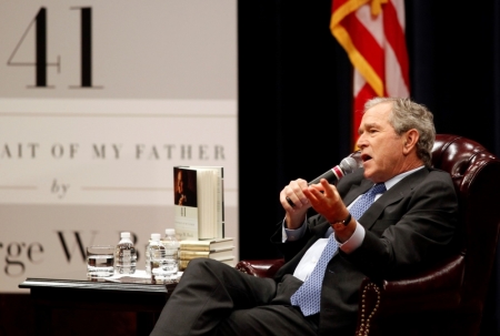 Former United States President George W. Bush speaks at a program to launch his new book titled "41: A Portrait of My Father" at the George Bush Presidential Library Center in College Station, Texas, November 11, 2014.