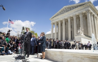 Douglas Hallward-Driemeier and Mary Bonauto, lawyers for the plaintiffs in Obergefell v. Hodges, speak to the media after arguments about gay marriage at the Supreme Court in Washington, April 28, 2015. The Supreme Court appeared sharply divided on Tuesday along ideological lines on whether the Constitution guarantees a right to same-sex marriage, but Justice Anthony Kennedy, a pivotal vote, seemed open to legalizing gay marriage nationwide.
