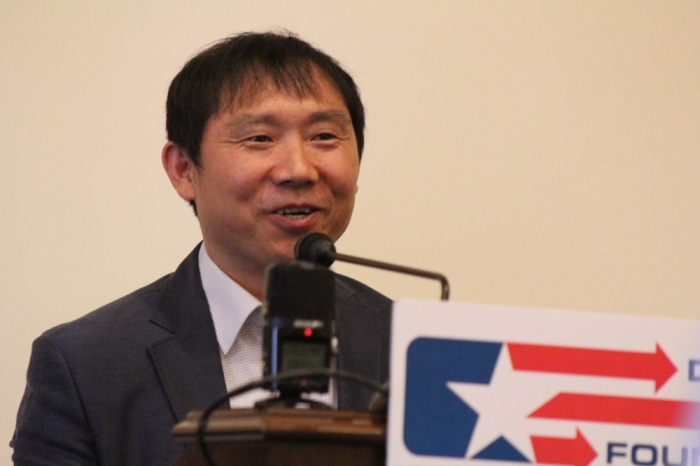 Pastor Kang Chul-ho, who is the first North Korean defector to be ordained as a Methodist minister, speaks at a forum on North Korean freedom at the Rayburn House Office Building on Capitol Hill May 1, 2015.