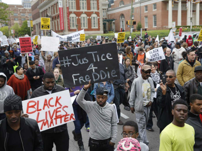 Protesters march for Freddie Gray, 25-year-old fatally injured while in police custody, in the streets of Baltimore, Md., on April 25, 2015.