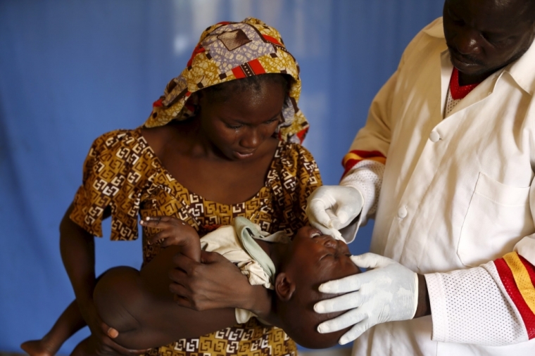 A child rescued from Boko Haram in Sambisa forest is attended to at a clinic at the Internally Displaced People's camp in Yola, Adamawa State, Nigeria, May 3, 2015. Hundreds of traumatised Nigerian women and children rescued from Boko Haram Islamists have been released into the care of authorities at a refugee camp in the eastern town of Yola, an army spokesman said.