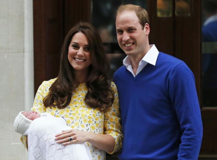 Britain's Prince William and his wife Catherine, Duchess of Cambridge, appear with their baby daughter outside the Lindo Wing of St Mary's Hospital, in London, Britain May 2, 2015. The Duchess of Cambridge, gave birth to a girl, the couple's second child and a sister to one-year-old Prince George.